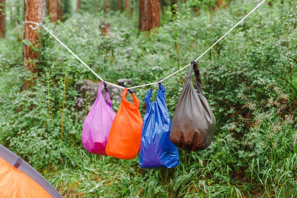 Hanging stuff sacks during camping