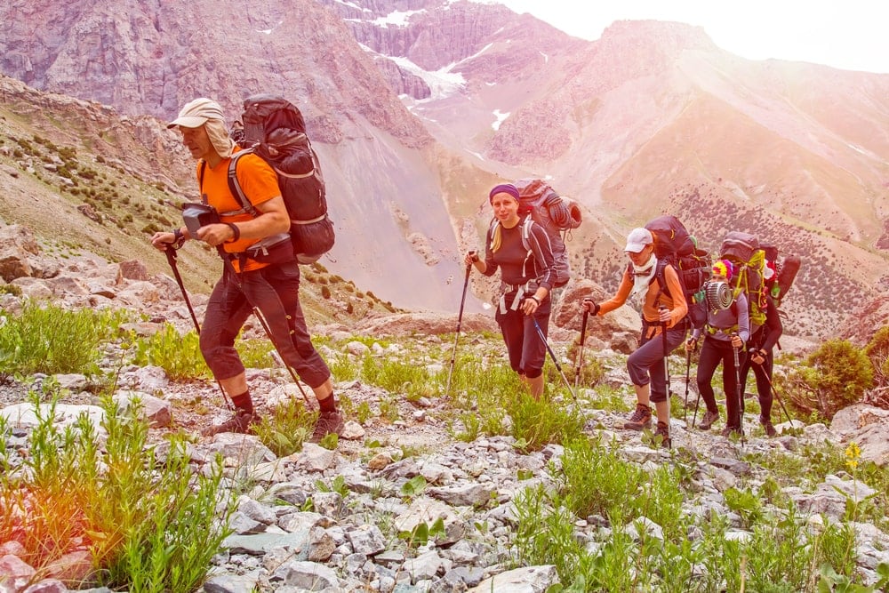 Outdoor guide leading hikers on the mountain