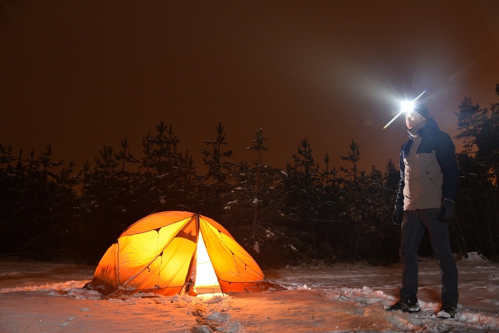 Man outside a tent