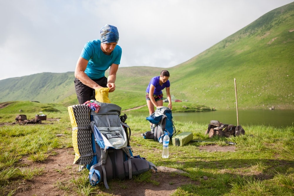Hikers packing their hiking gears
