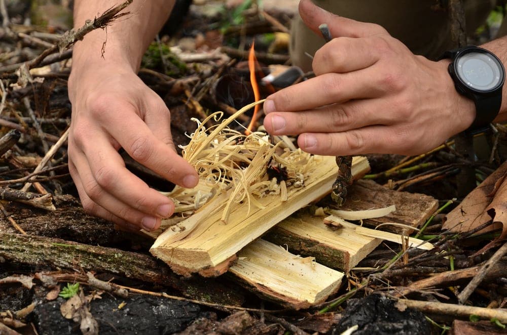 Man starting a fire