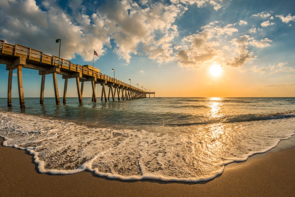 Afternoon sun over Gulf of Mexico and Venice Pier in Venice Florida