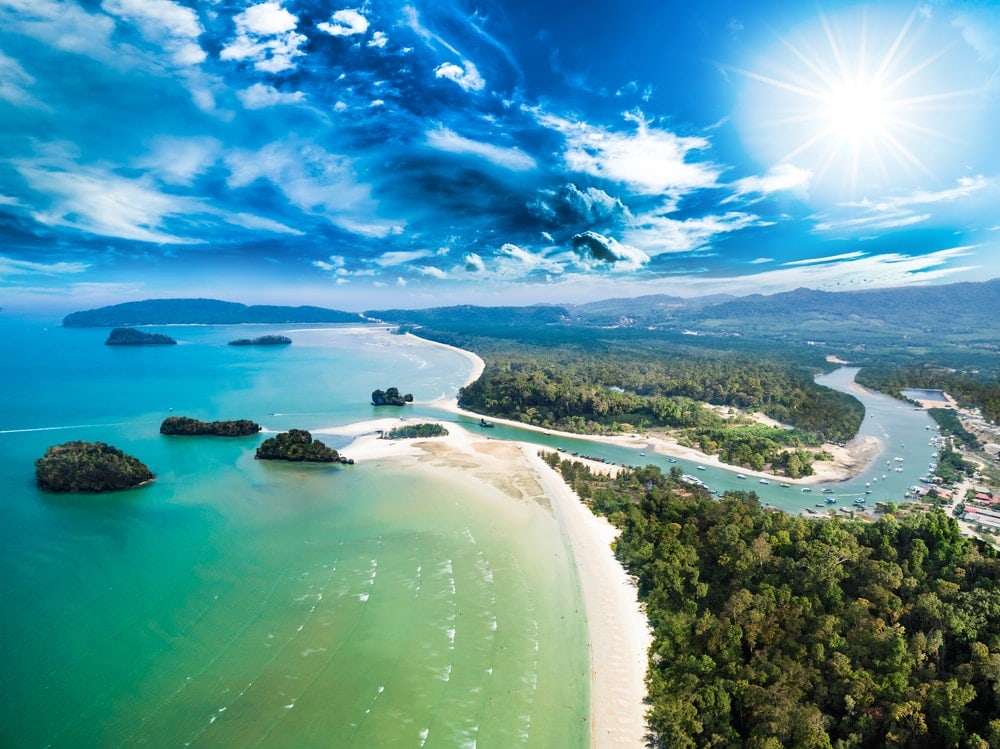 Aerial view of estuary, river, beach and islands with deep blue sky