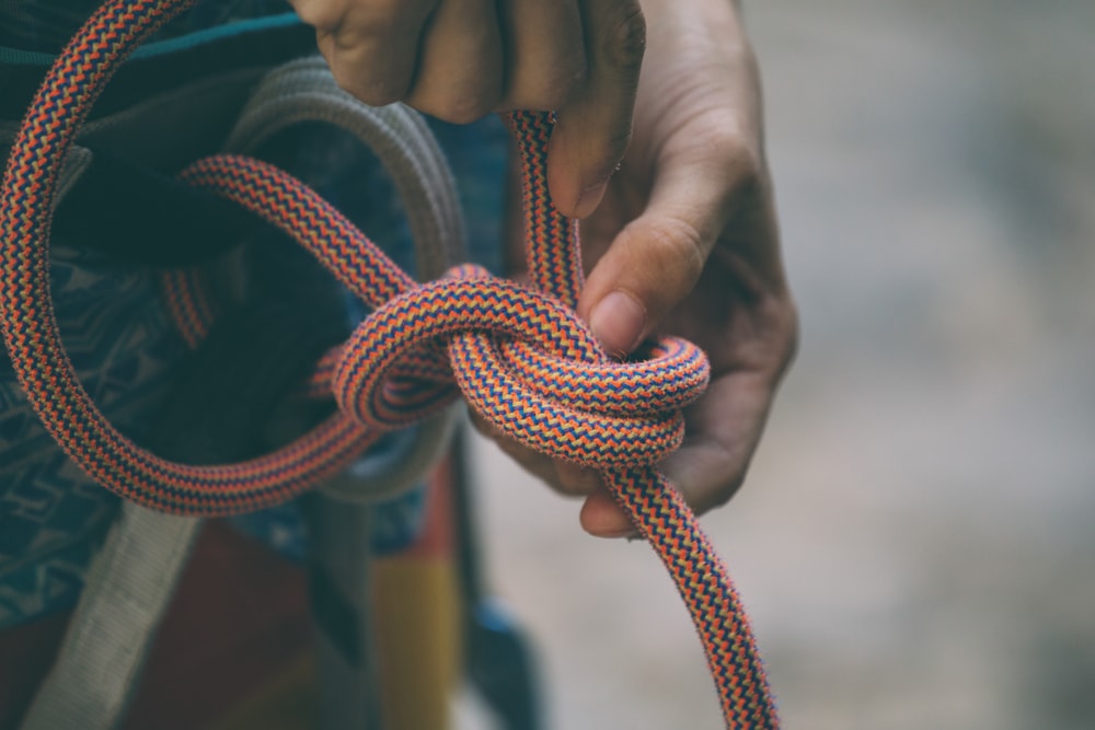 Man tying a knot