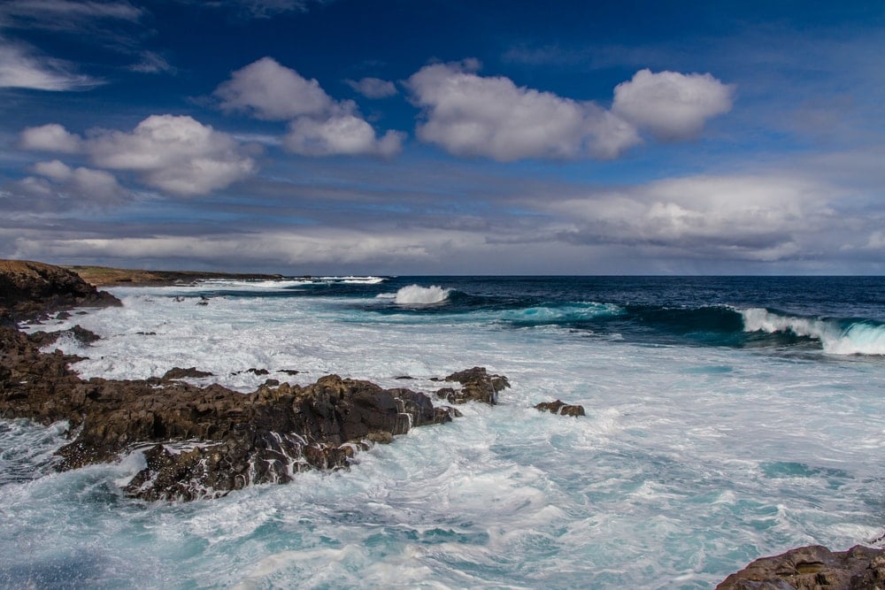 Ocean waves on rocks due to high tide