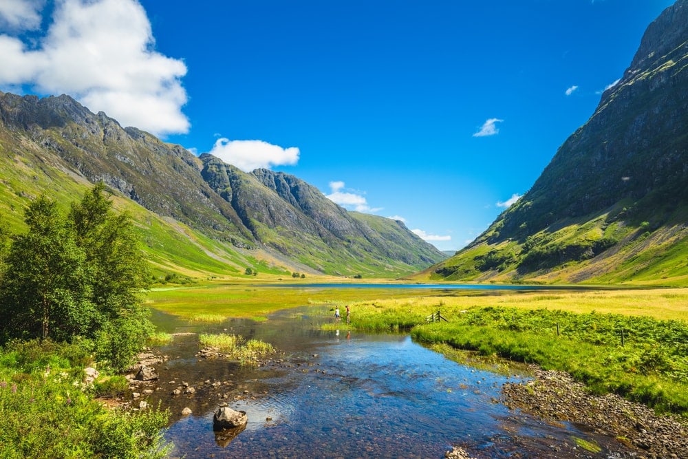 Image of mountains, valley, and river.