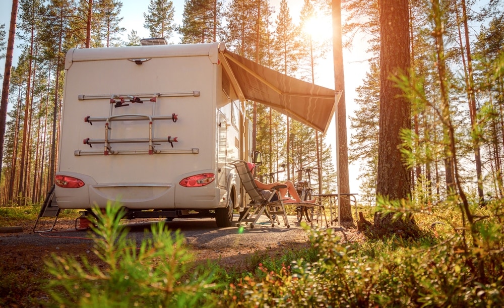 RV camping in national forest on a sunny day