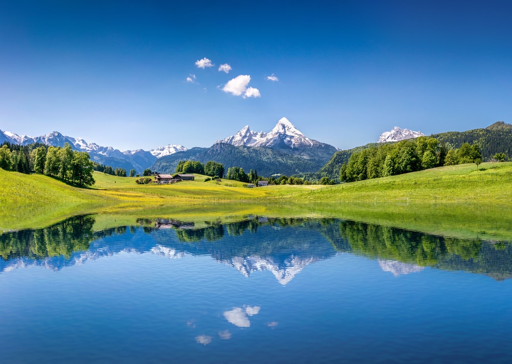 The Alps with clear mountain and lake during a sunny weather