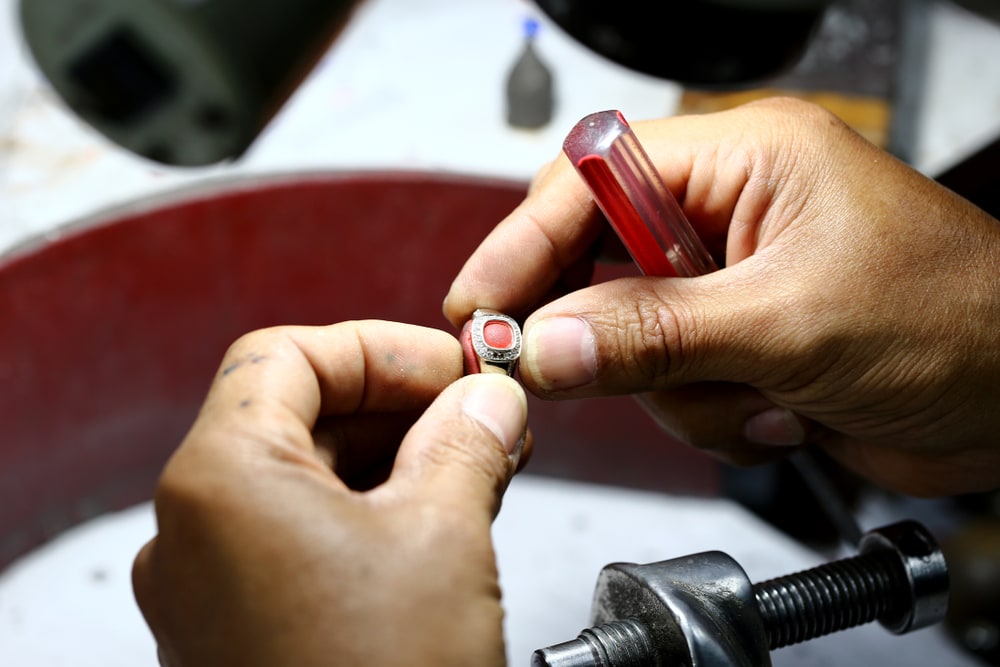 a ring with gemstone inlay housing decoration