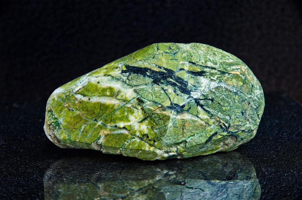 Serpentinite, Metamorphic Rocks example, on black background