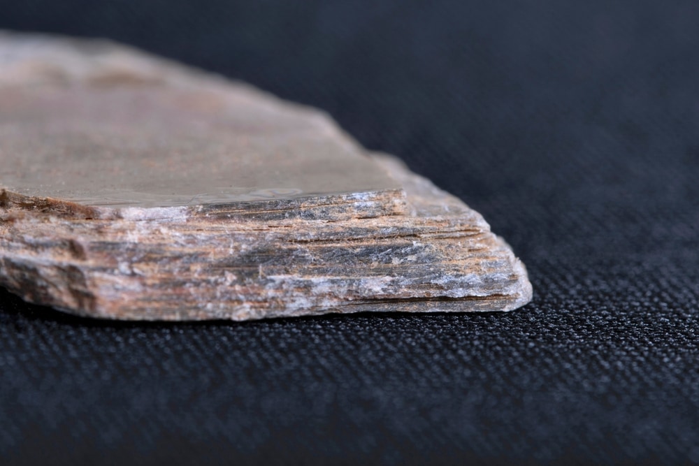 Schist rock laying on clothing