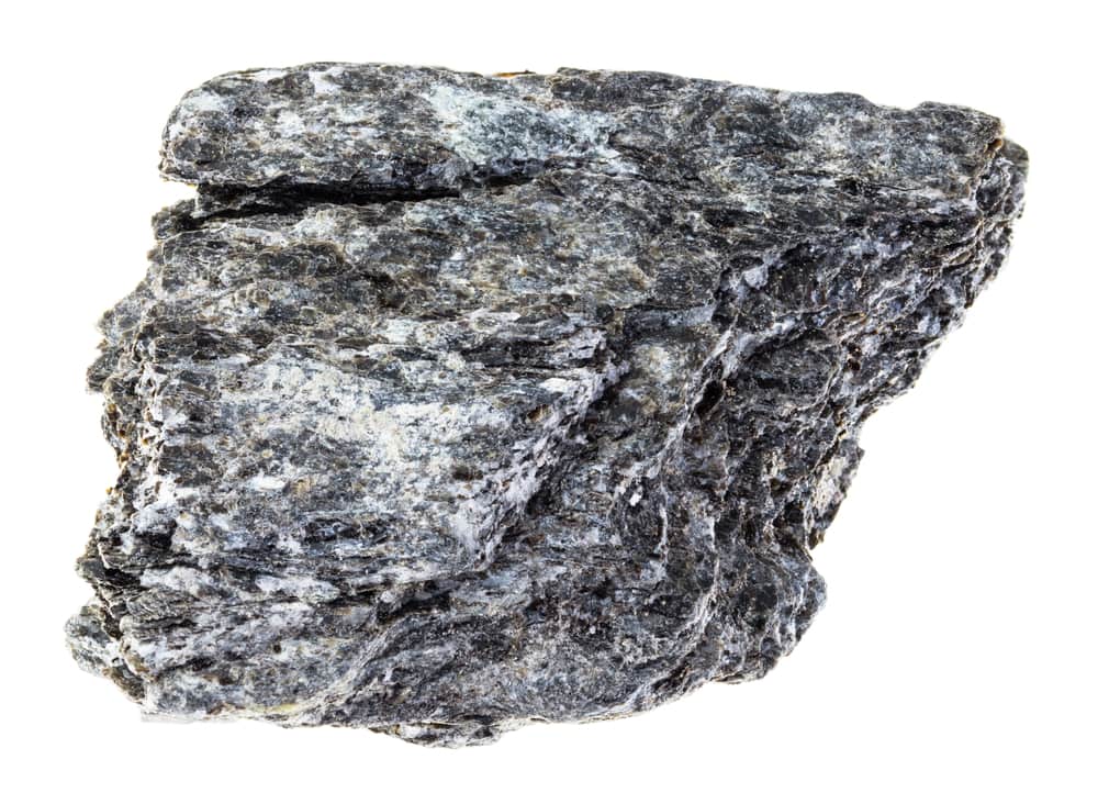 Schist rock on white background