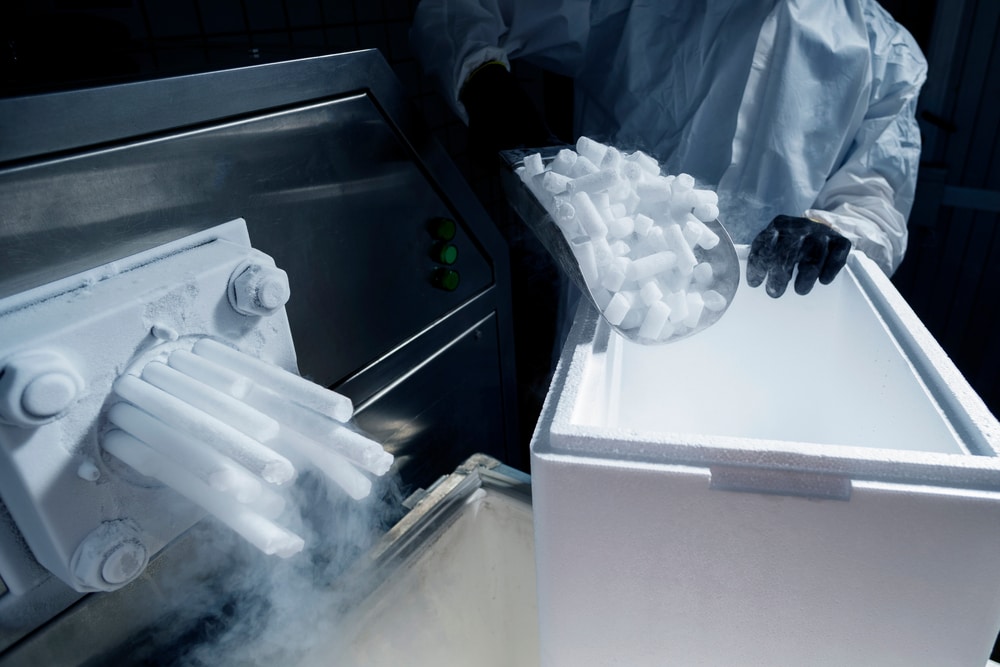 Dry ice being put inside a styro box