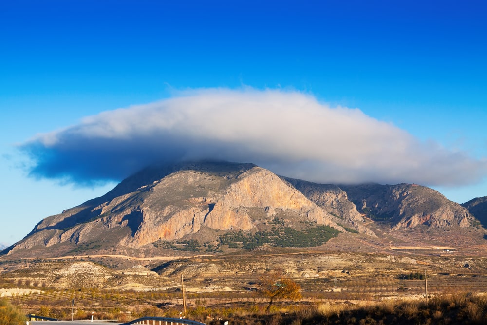 Lenticular Clouds formed on top of a mountain