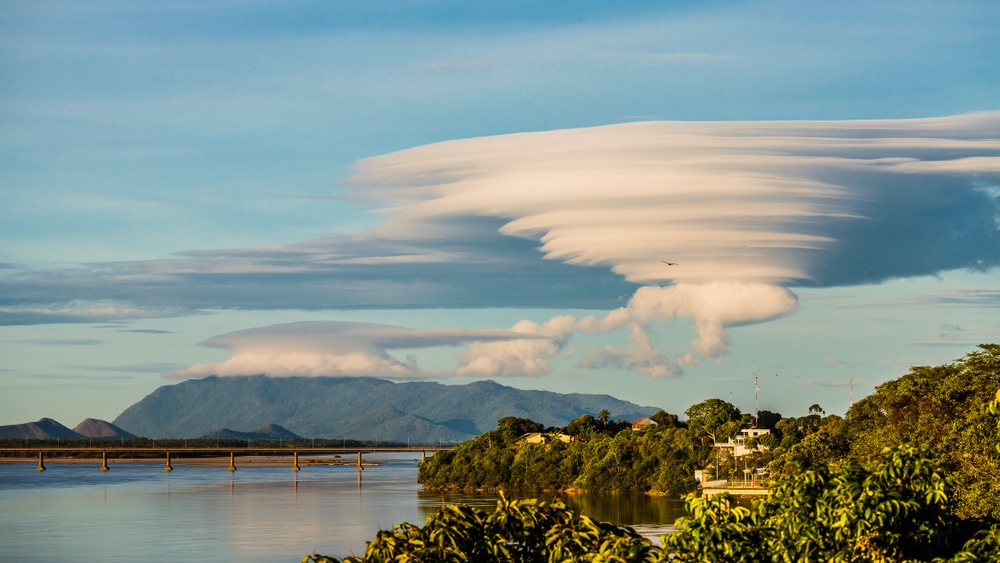 Lenticular Clouds seen above a bridge