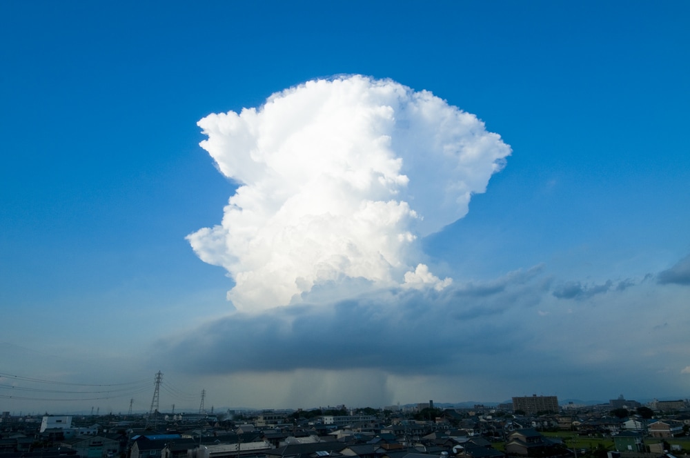Cumulonimbus clouds above an urban area