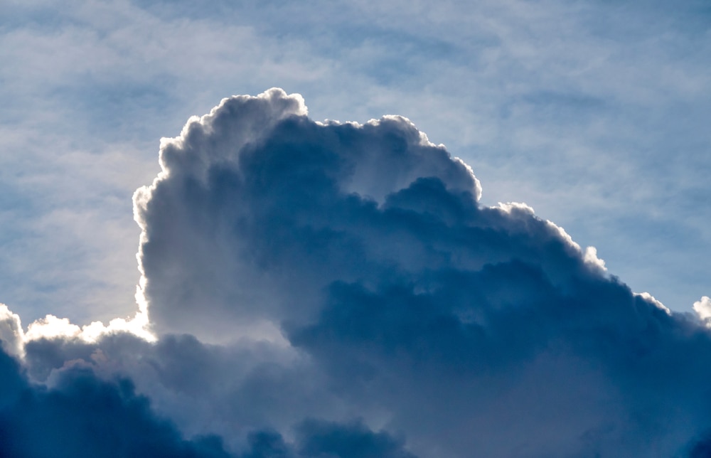 Cumulonimbus cloud behind the sun