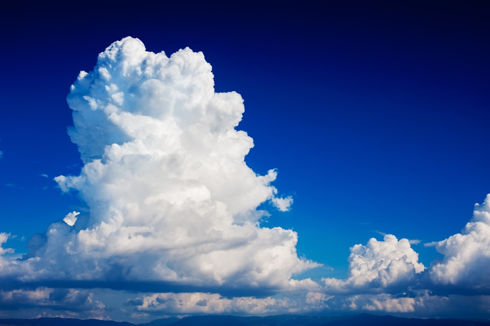 Group of Cumulonimbus Clouds formed in blue sky