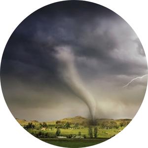 image of a cone tornado hitting up a village