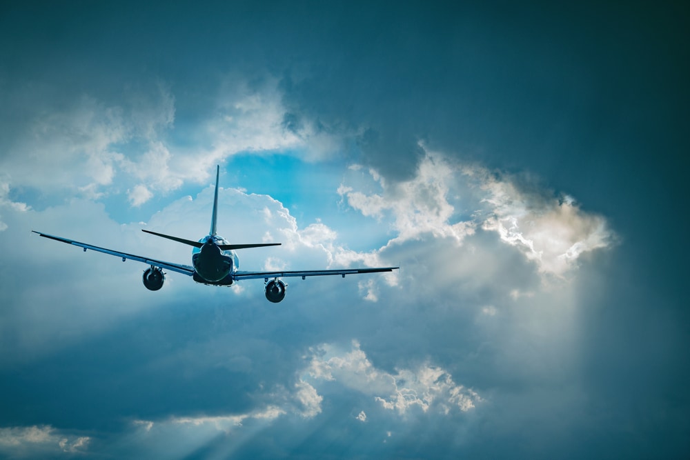Plane going through the virga clouds