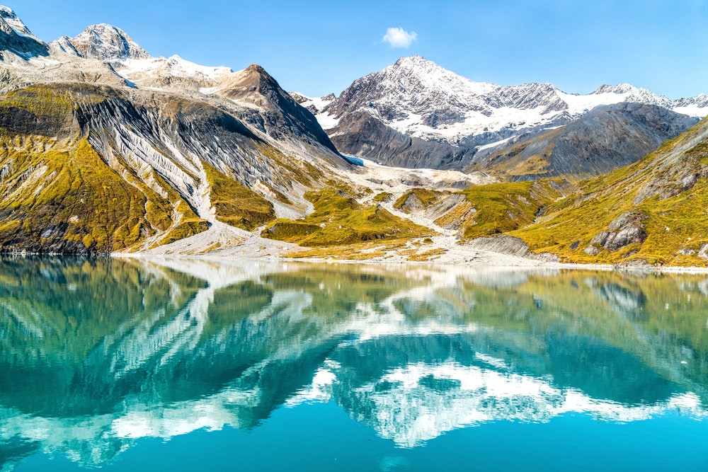 Glacier Bay with the reflection of its mountain