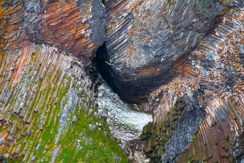 Igneous rocks closing the entrance of a cave