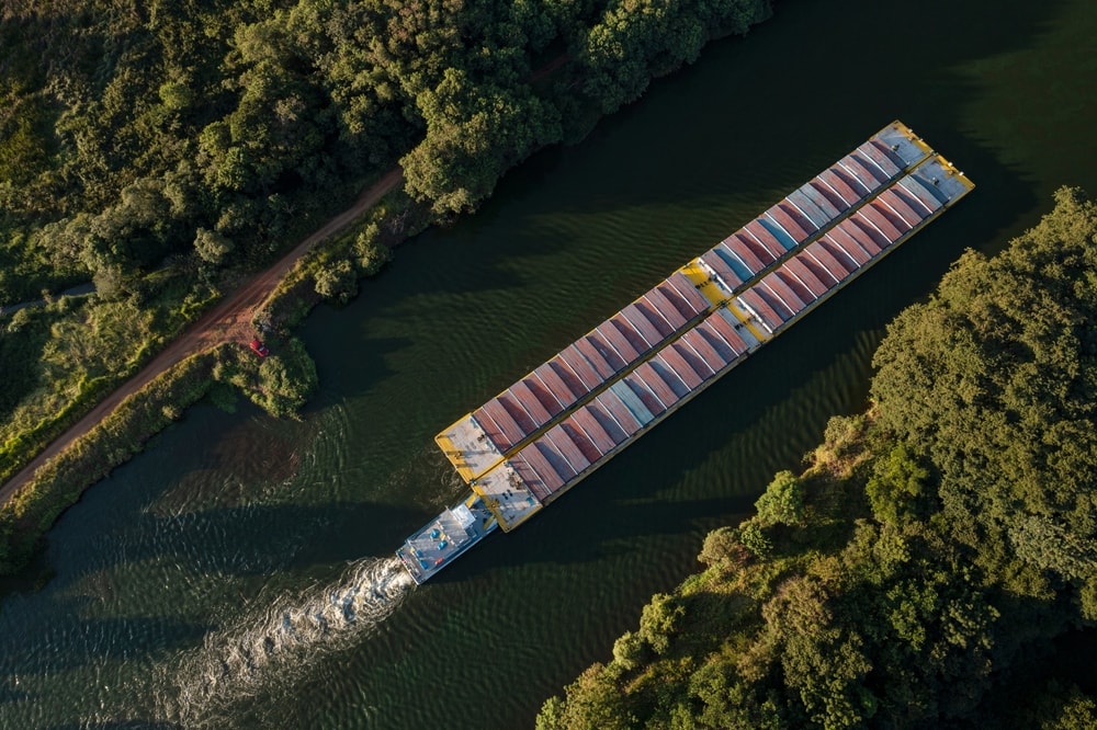 Truck of supplies on a ship heading through waterways