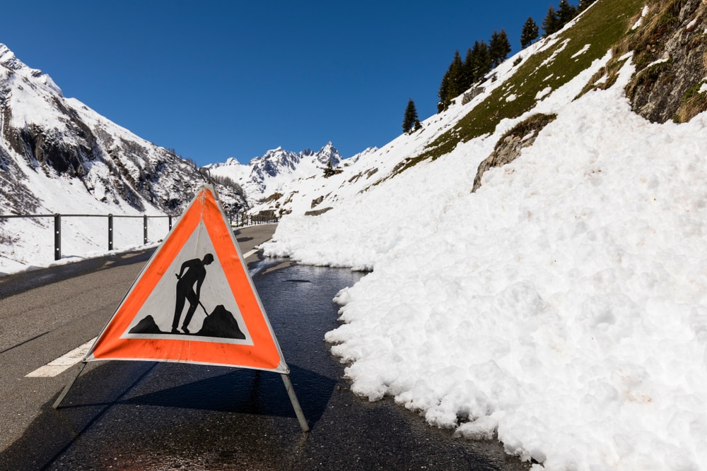 road blockage sign caused by an avalanche