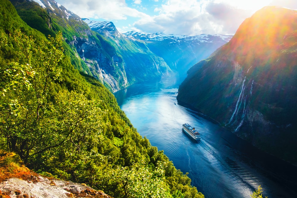 Cruise ship roaming around the fjords of Norway