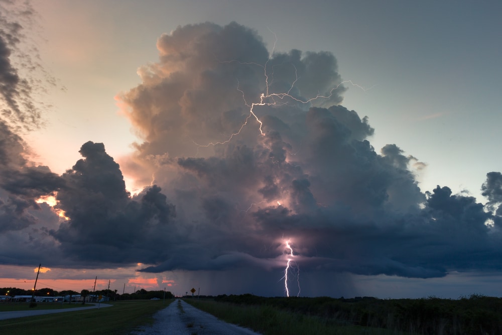 Cumulonimbus clouds striking its lightning