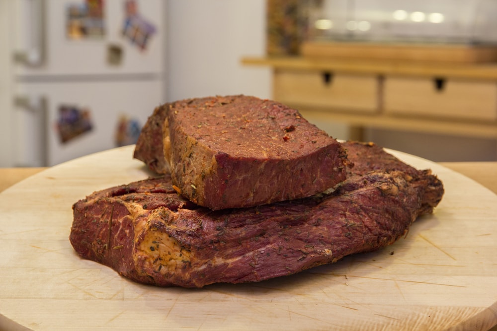 homemade beef pemmican on a wooden board