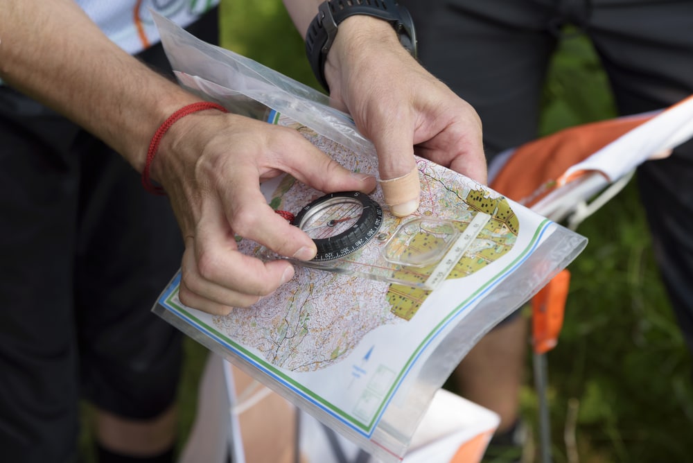 using compass and map for orienteering