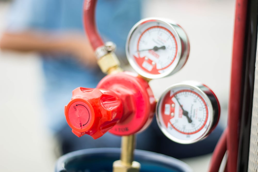 image of a gauge and valve on an LPG tank
