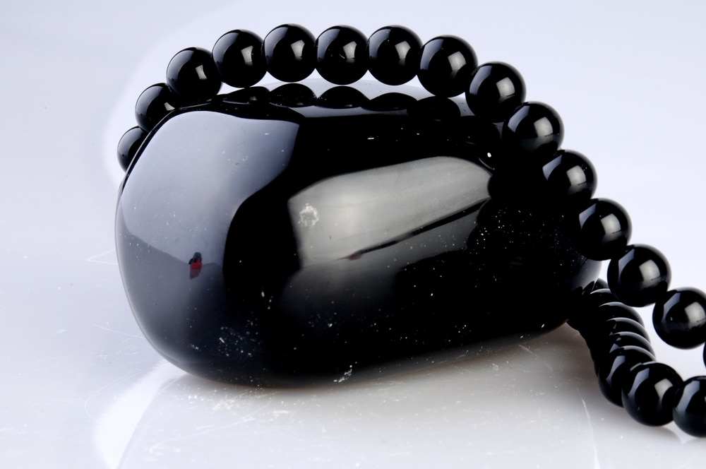 necklace made from polished obsidian stone