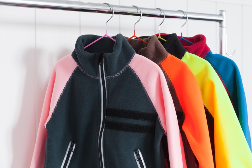 fleece jackets on a rack