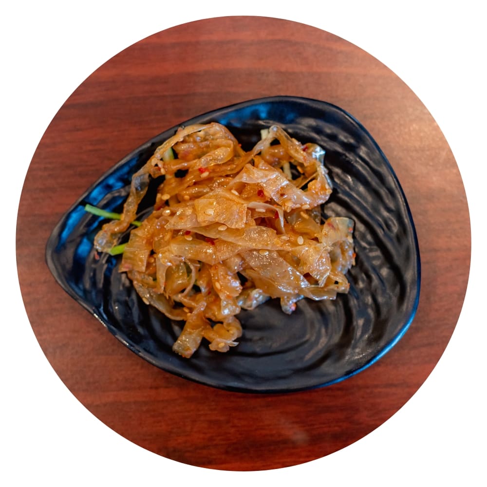 image of a seasoned jellyfish in a bowl