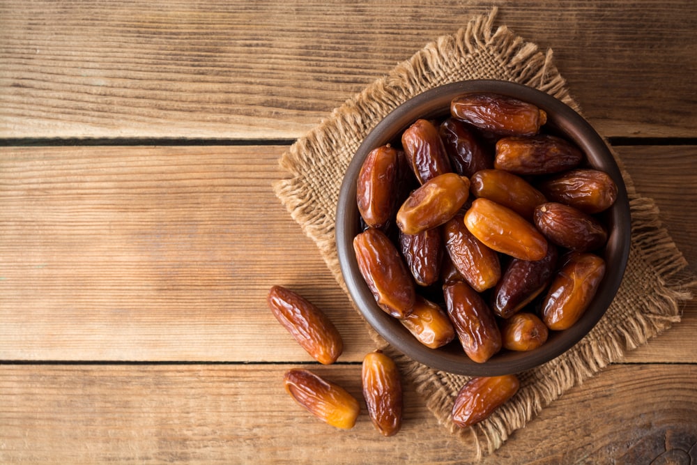 Pygmy date palm fruits on a table