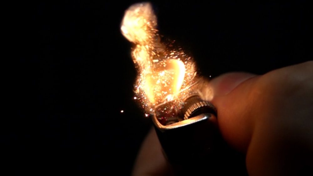 Turning on a lighter in the dark
