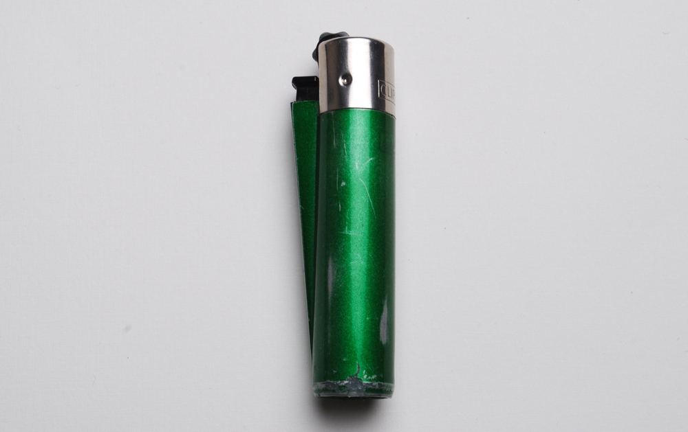 Clipper Lighters on top of a white table