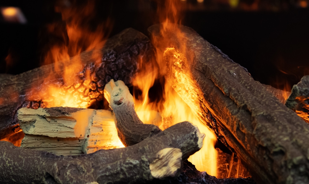 Wood lit on fire in the dark
