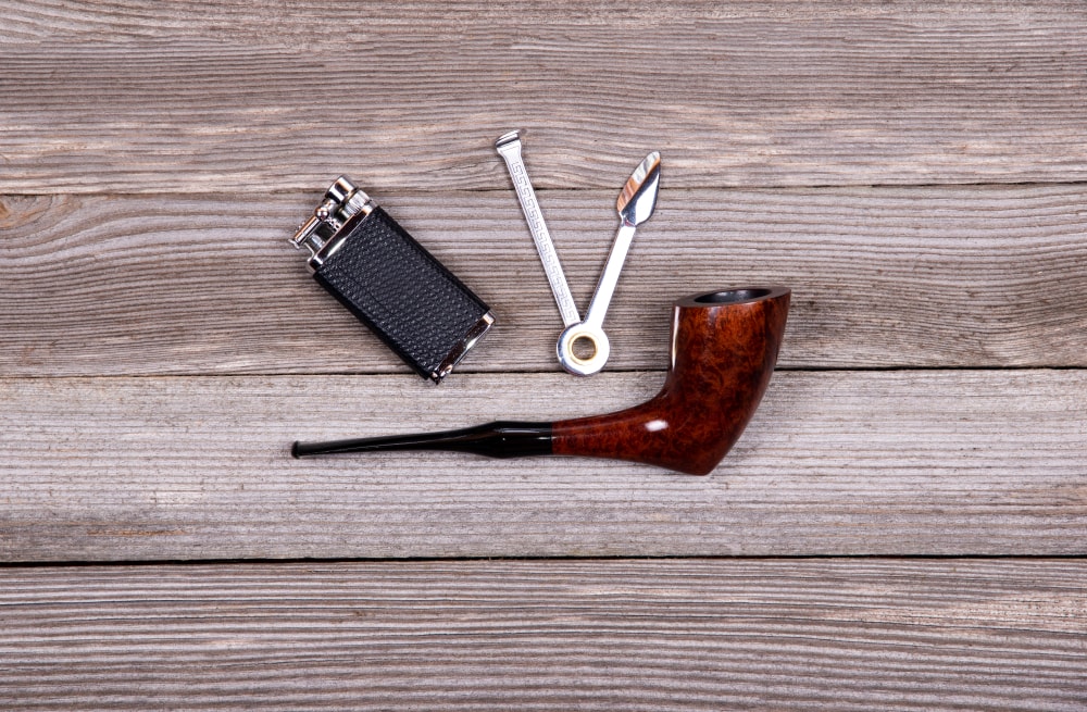 Pipe Lighter laying on a wooden table