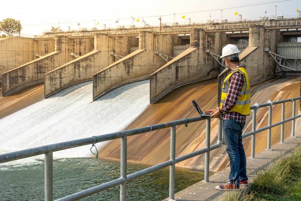 an engineer checking a dam routing check up