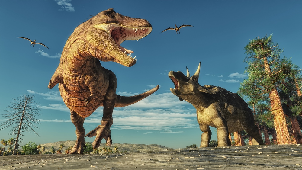 3D picture of two dinosaurs playing around the forest