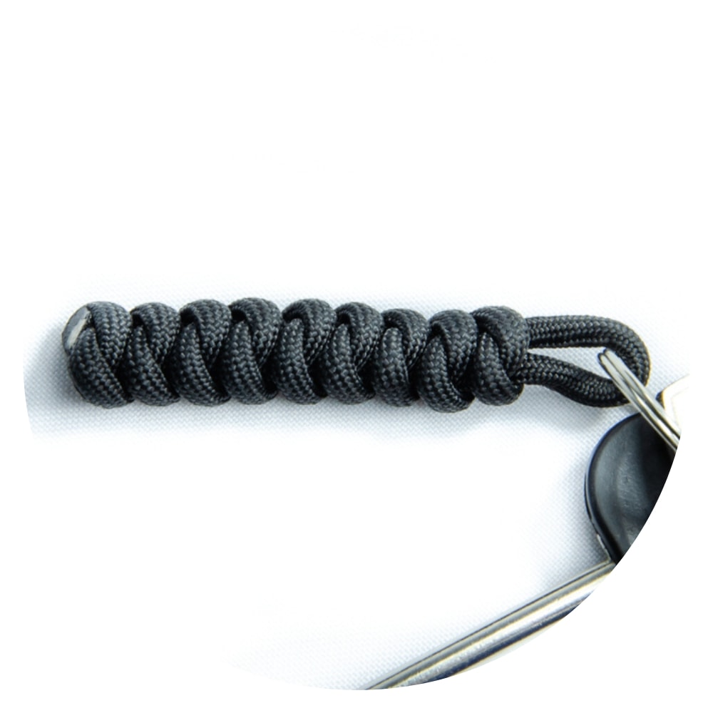 image of a black paracord in a snake knot