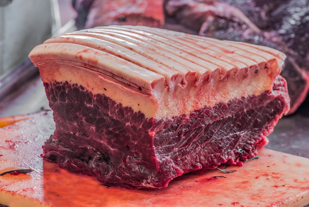 Meat of a whale butchered on the table