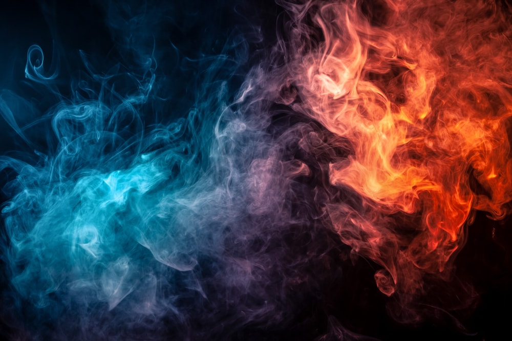 Blue and red fire on black background