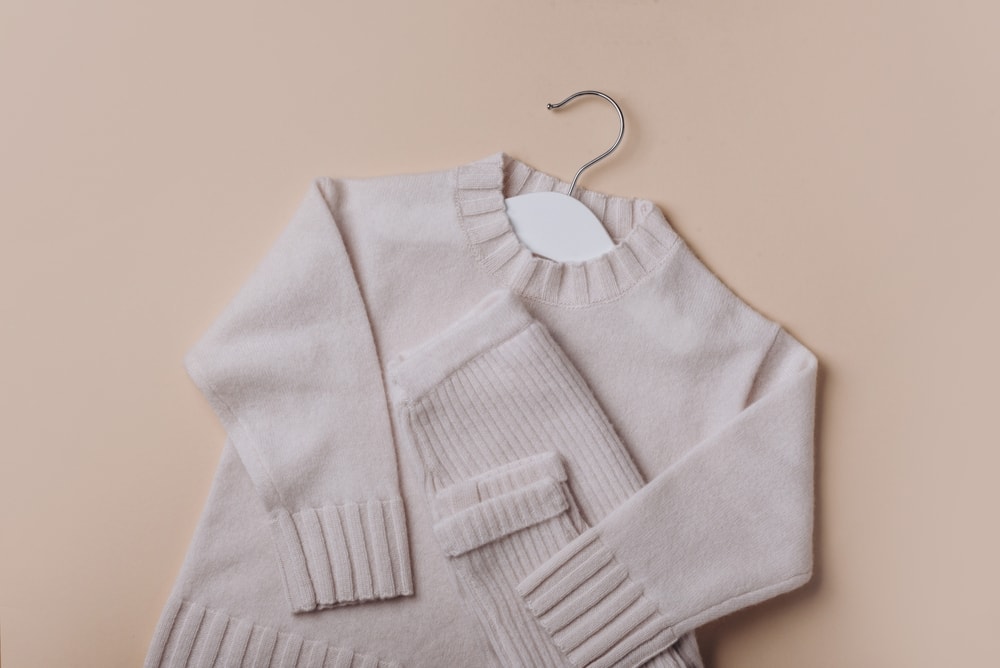 a beige sweatshirt made of merino wool