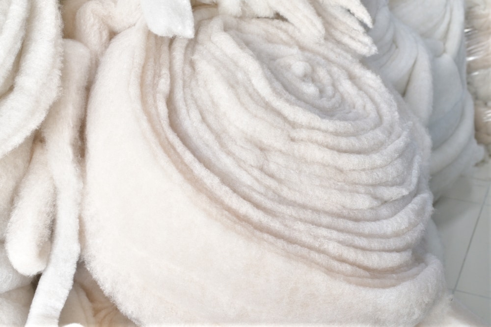 a roll of synthetic insulation material used for clothing