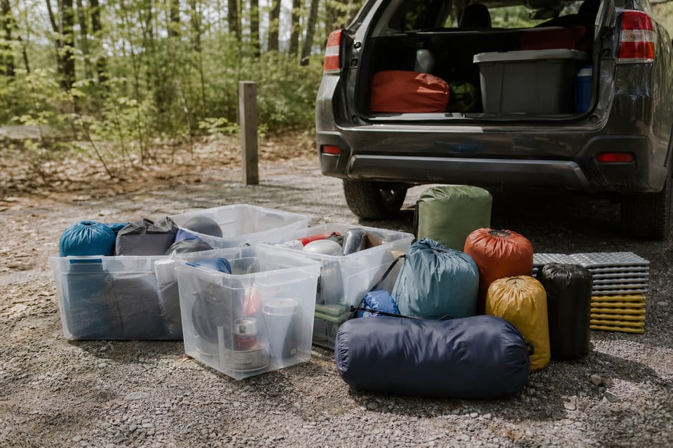 Camping gear properly organized in table
