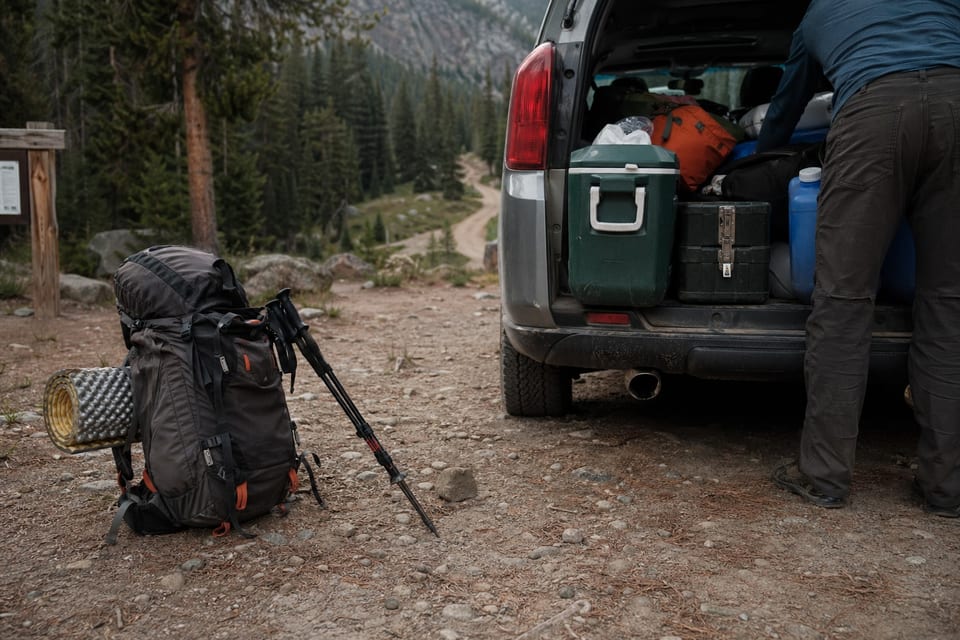 Girl covered with a blanket inside a camper